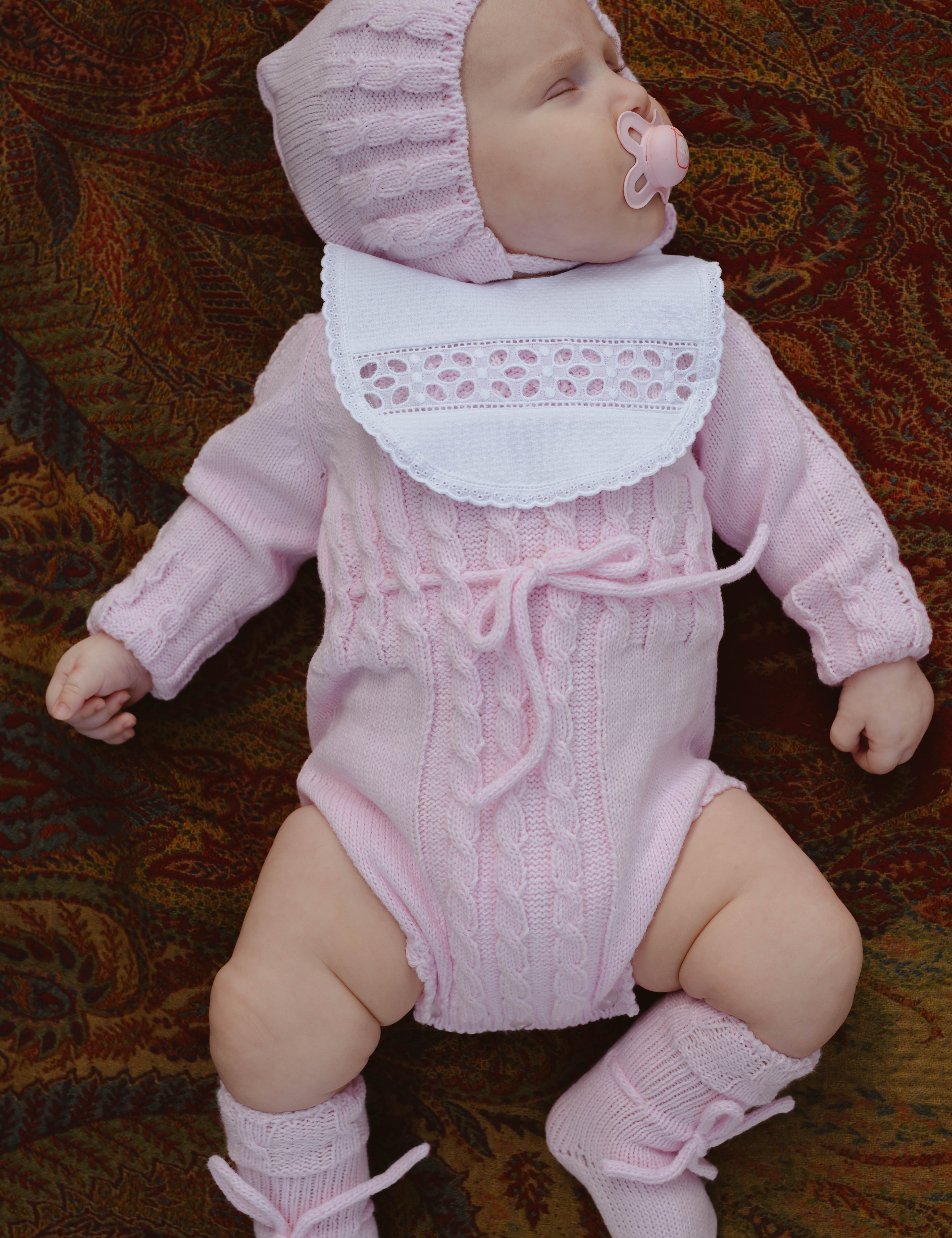 Pelele ochos rosa bebé